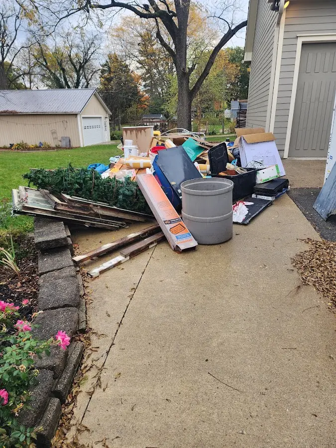 Dumpster being loaded with debris for Commercial Dumpster Rental in Cloverdale
